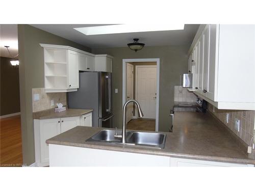 135 Weston Drive, Tillsonburg, ON - Indoor Photo Showing Kitchen With Double Sink