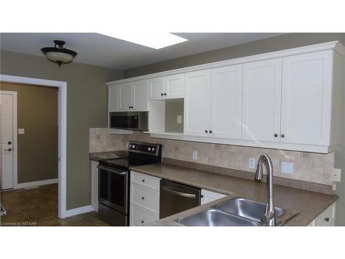 135 Weston Drive, Tillsonburg, ON - Indoor Photo Showing Kitchen With Double Sink