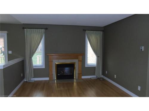 135 Weston Drive, Tillsonburg, ON - Indoor Photo Showing Living Room With Fireplace