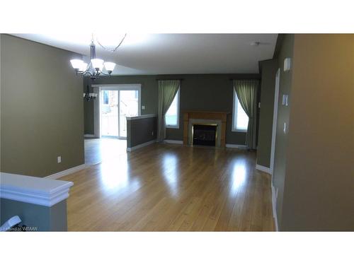 135 Weston Drive, Tillsonburg, ON - Indoor Photo Showing Living Room With Fireplace