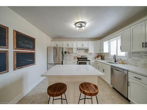 21 Oriole Crescent, Woodstock, ON - Indoor Photo Showing Kitchen With Double Sink