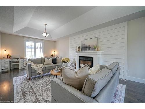 21 Oriole Crescent, Woodstock, ON - Indoor Photo Showing Living Room With Fireplace