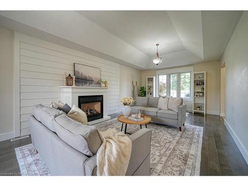 21 Oriole Crescent, Woodstock, ON - Indoor Photo Showing Living Room With Fireplace