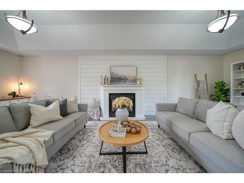 21 Oriole Crescent, Woodstock, ON - Indoor Photo Showing Living Room With Fireplace