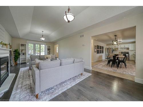 21 Oriole Crescent, Woodstock, ON - Indoor Photo Showing Living Room With Fireplace