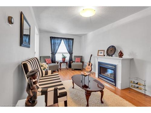 7 Primrose Drive, Tillsonburg, ON - Indoor Photo Showing Living Room With Fireplace