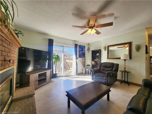 98 Allen Street, Tillsonburg, ON - Indoor Photo Showing Living Room With Fireplace