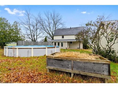 301 Plowmans Line, Tillsonburg, ON - Outdoor With Above Ground Pool With Backyard