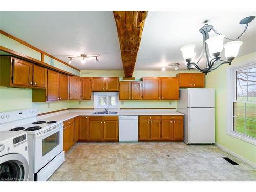 301 Plowmans Line, Tillsonburg, ON - Indoor Photo Showing Kitchen With Double Sink