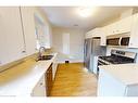 2-145 Vansittart Avenue, Woodstock, ON  - Indoor Photo Showing Kitchen With Stainless Steel Kitchen With Double Sink 