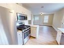 2-145 Vansittart Avenue, Woodstock, ON  - Indoor Photo Showing Kitchen 