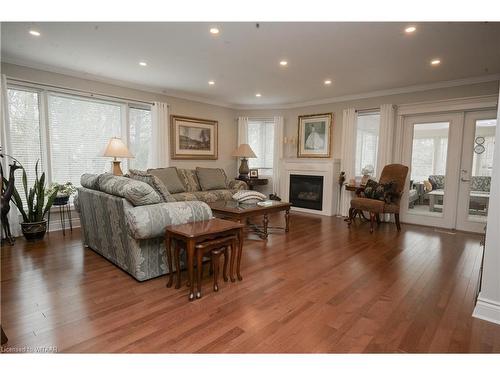 11 Mcdonald Court, Tillsonburg, ON - Indoor Photo Showing Living Room With Fireplace