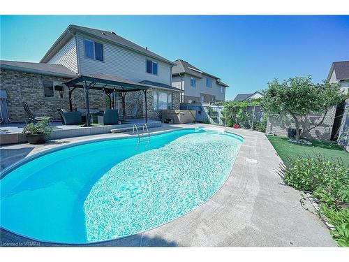 905 Woodbine Court, Kitchener, ON - Outdoor With In Ground Pool With Backyard