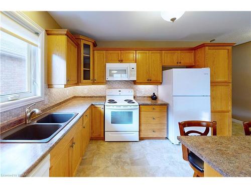 23 Hogarth Drive, Tillsonburg, ON - Indoor Photo Showing Kitchen With Double Sink