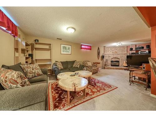 22 Coxwell Crescent, Brantford, ON - Indoor Photo Showing Living Room With Fireplace