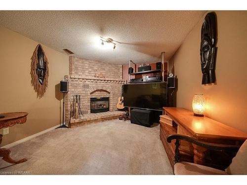 22 Coxwell Crescent, Brantford, ON - Indoor With Fireplace