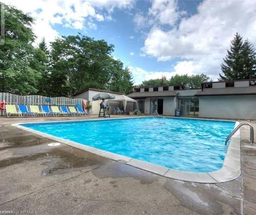 83-30 Green Valley Drive, Kitchener, ON - Outdoor With In Ground Pool