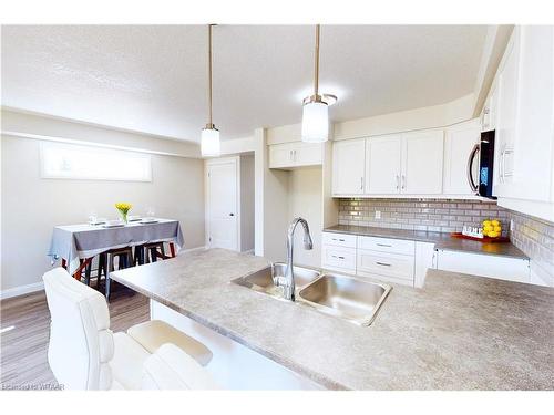 A-137 Wimpole Street, Mitchell, ON - Indoor Photo Showing Kitchen With Double Sink