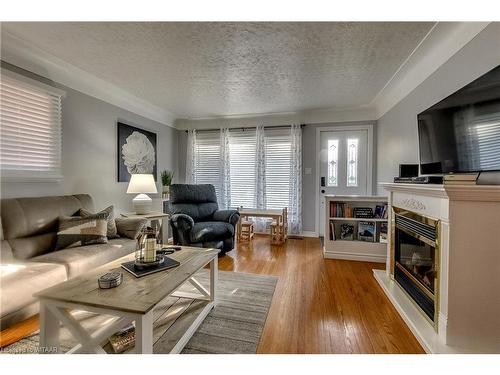 43 Clarke Street N, Woodstock, ON - Indoor Photo Showing Living Room With Fireplace