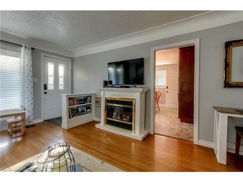 43 Clarke Street N, Woodstock, ON - Indoor Photo Showing Living Room With Fireplace