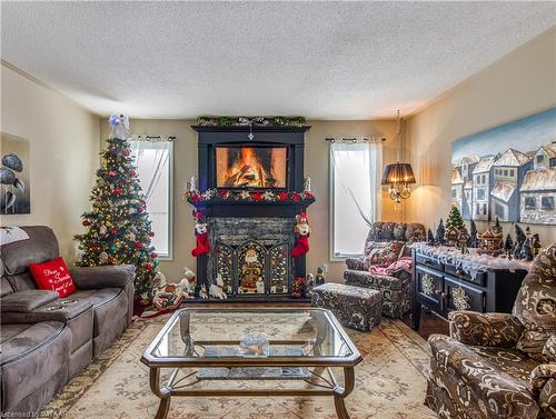 9 Brasher Drive, Tillsonburg, ON - Indoor Photo Showing Living Room With Fireplace