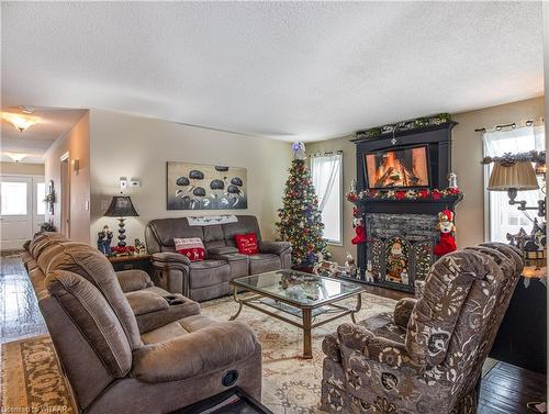 9 Brasher Drive, Tillsonburg, ON - Indoor Photo Showing Living Room With Fireplace