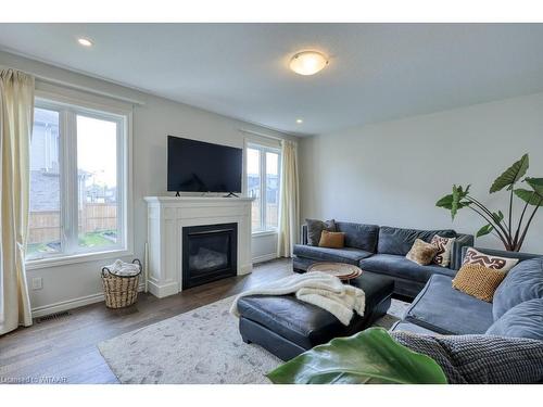 59 Hollingshead Road, Ingersoll, ON - Indoor Photo Showing Living Room With Fireplace