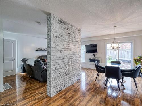 576 Champlain Avenue, Woodstock, ON - Indoor Photo Showing Dining Room With Fireplace