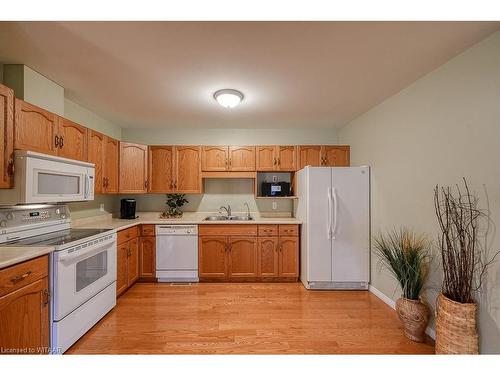 16 Cardinal Drive, Woodstock, ON - Indoor Photo Showing Kitchen With Double Sink