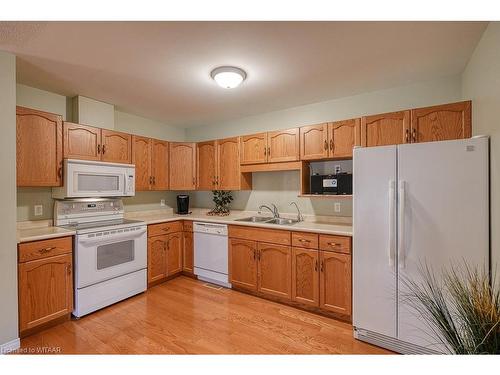 16 Cardinal Drive, Woodstock, ON - Indoor Photo Showing Kitchen With Double Sink