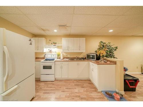 16 Cardinal Drive, Woodstock, ON - Indoor Photo Showing Kitchen With Double Sink