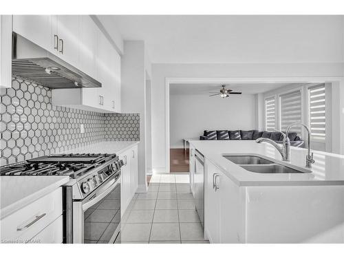 1000 Centennial Court, Woodstock, ON - Indoor Photo Showing Kitchen With Double Sink With Upgraded Kitchen