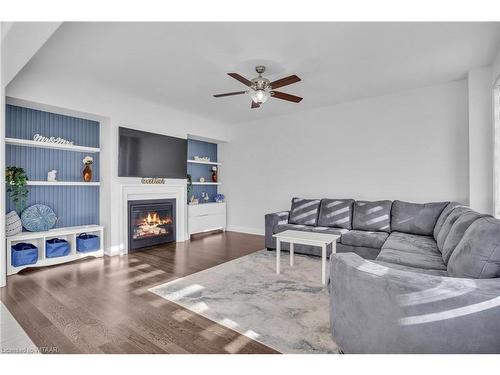 1000 Centennial Court, Woodstock, ON - Indoor Photo Showing Living Room With Fireplace