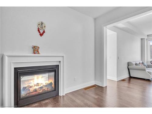 1000 Centennial Court, Woodstock, ON - Indoor Photo Showing Living Room With Fireplace