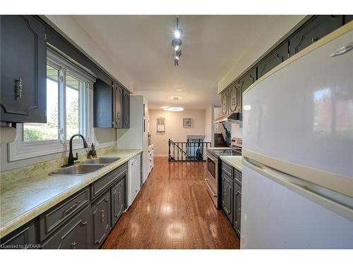 14 Marshall Drive, Norwich, ON - Indoor Photo Showing Kitchen With Double Sink