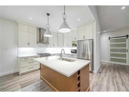 303-5 Wood Haven Dr Drive, Tillsonburg, ON - Indoor Photo Showing Kitchen With Stainless Steel Kitchen With Double Sink With Upgraded Kitchen