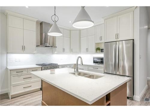 303-5 Wood Haven Dr Drive, Tillsonburg, ON - Indoor Photo Showing Kitchen With Stainless Steel Kitchen With Double Sink With Upgraded Kitchen