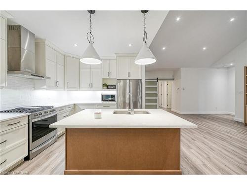 303-5 Wood Haven Dr Drive, Tillsonburg, ON - Indoor Photo Showing Kitchen With Stainless Steel Kitchen With Double Sink With Upgraded Kitchen