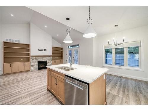 303-5 Wood Haven Dr Drive, Tillsonburg, ON - Indoor Photo Showing Kitchen With Fireplace With Double Sink