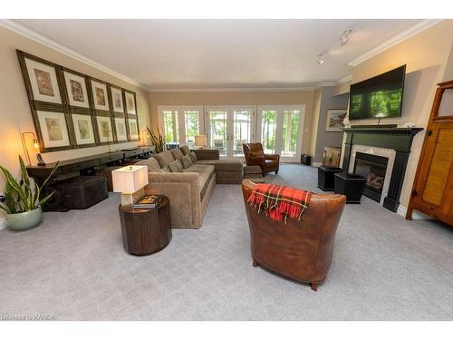 16 Riverside Drive, Kingston, ON - Indoor Photo Showing Living Room With Fireplace