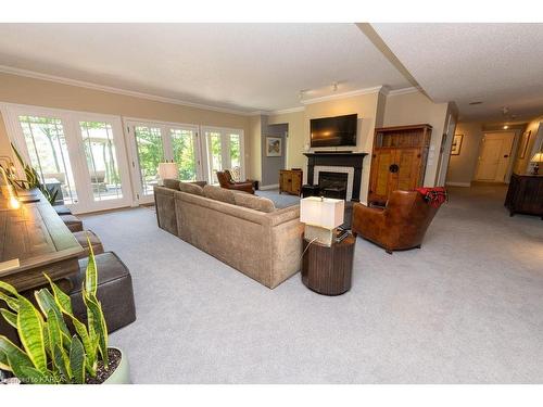 16 Riverside Drive, Kingston, ON - Indoor Photo Showing Living Room With Fireplace