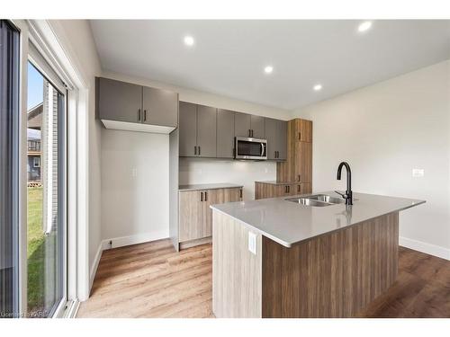 116 Potter Drive, Odessa, ON - Indoor Photo Showing Kitchen With Double Sink