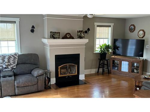 540 Cutler Road, Yarker, ON - Indoor Photo Showing Living Room With Fireplace