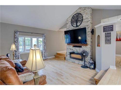 5525 Rideau Road, Seeleys Bay, ON - Indoor Photo Showing Living Room With Fireplace
