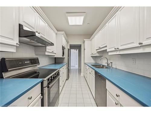305-20 Gore Street, Kingston, ON - Indoor Photo Showing Kitchen With Double Sink