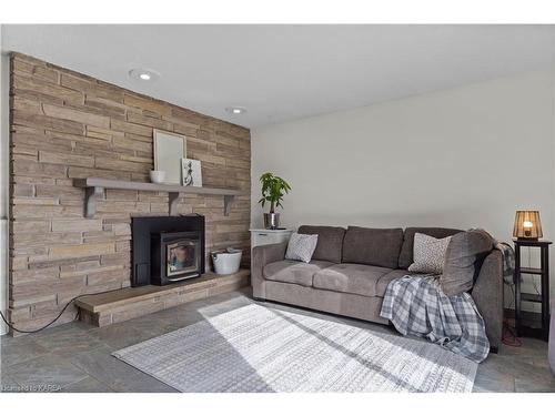 412 Card Road, Yarker, ON - Indoor Photo Showing Living Room With Fireplace