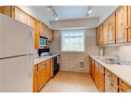 91 Ironwood Lane, Perth Road Village, ON - Indoor Photo Showing Kitchen With Double Sink