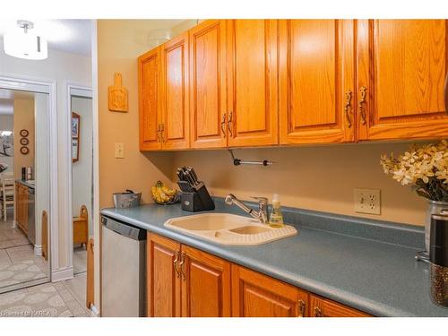 305-540 Talbot Place, Gananoque, ON - Indoor Photo Showing Kitchen With Double Sink