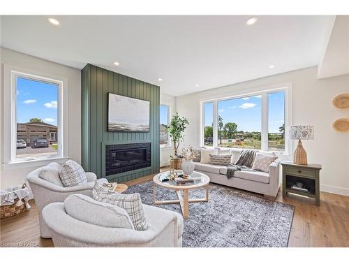 157 Mcdonough Crescent, Amherstview, ON - Indoor Photo Showing Living Room With Fireplace