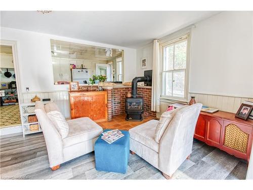 4503 Portland Avenue, Sydenham, ON - Indoor Photo Showing Living Room With Fireplace